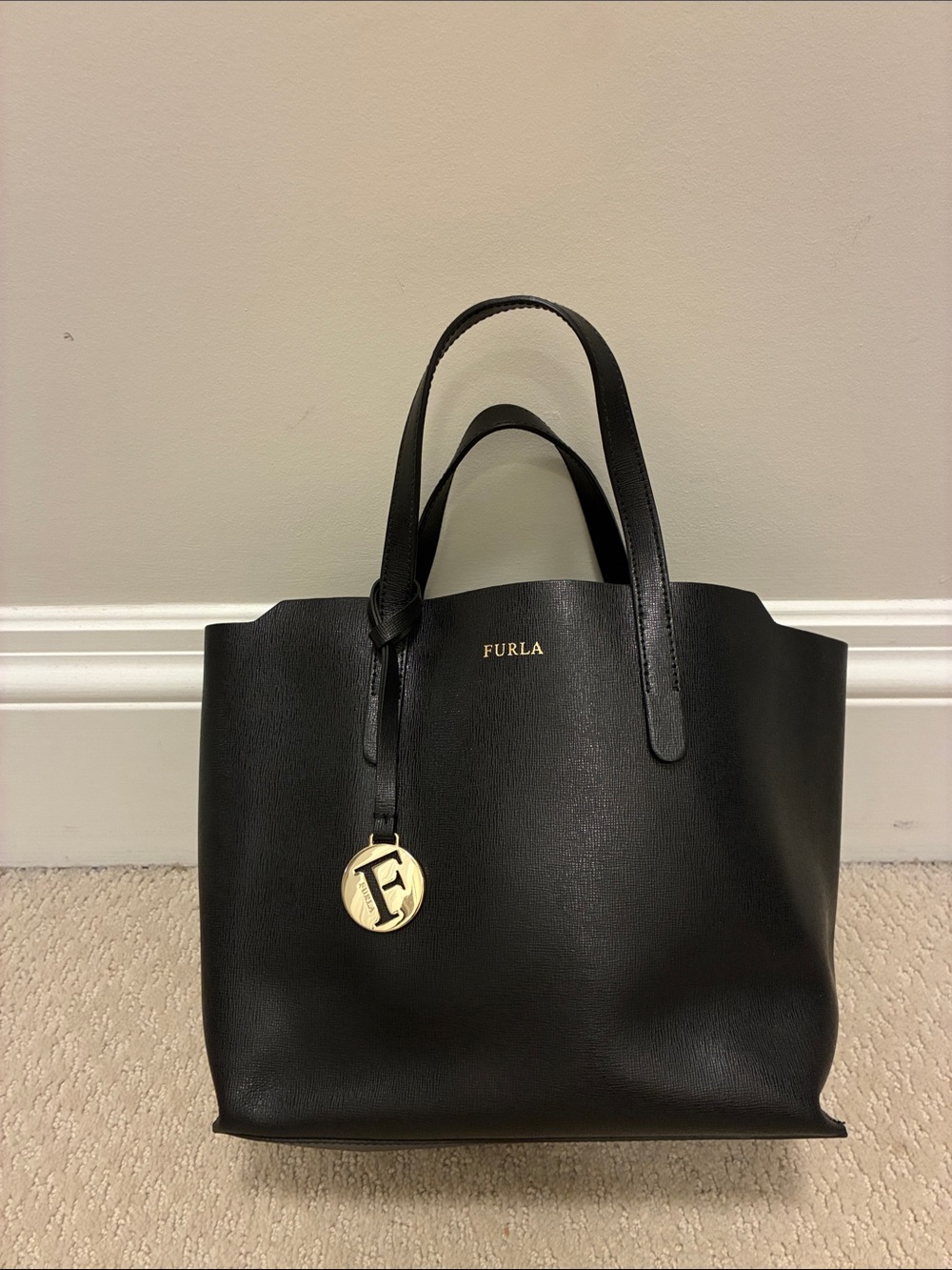 Furla Black Leather Tote with Gold Medallion 👝